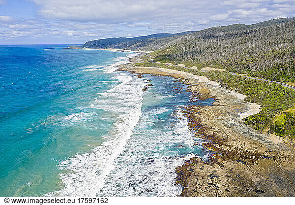 Australia  Victoria  Aerial view of rugged coastline along Great Ocean Road in summer