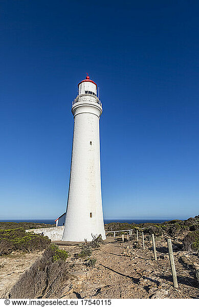Australia  Victoria  Cape Nelson Lighthouse standing against clear blue sky