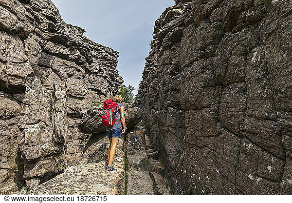 Australia  Victoria  Halls Gap  Female tourist traversing through Grand Canyon in Grampians National Park