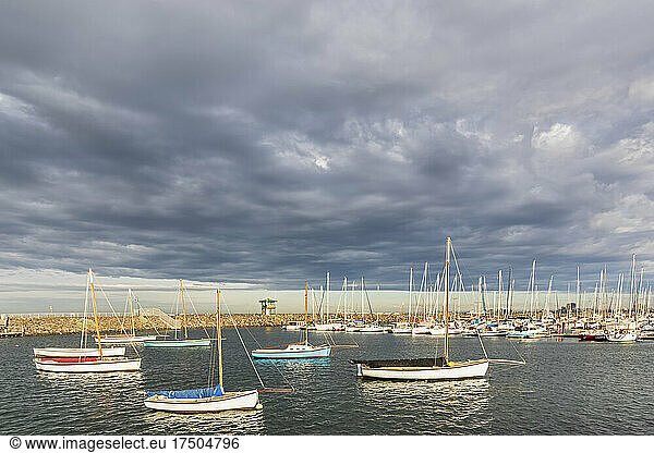 Australia  Victoria  Melbourne  Cloudy sky over yachts floating in Royal Melbourne Yacht Squadron marina