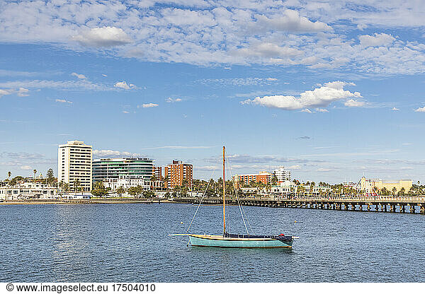 Australia  Victoria  Melbourne  Lone yacht floating in front of Saint Kilda Pier in summer