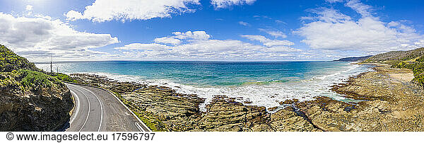 Australia  Victoria  Panoramic view of rugged coastline and stretch of Great Ocean Road in summer