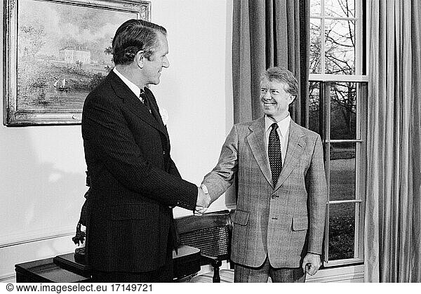Australian Prime Minister Malcolm Fraser shaking hands with U.S. President Jimmy Carter  Half-Length Portrait  Washington  D.C.  USA  1979  1970-1979  1970's  Marion S. Trikosko