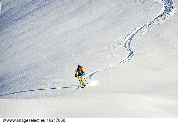Austria  Man skiing on mountain at Alpbachtal