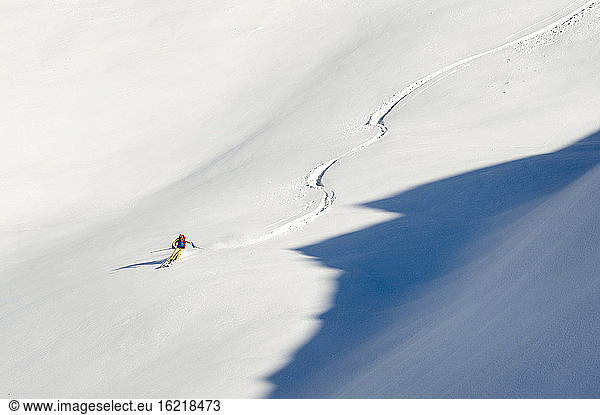 Austria  Man skiing on mountain at Alpbachtal