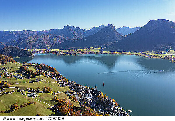 Austria  Salzburg  Sankt Wolfgang im Salzkammergut  Drone view of Lake Wolfgang and surrounding village in autumn