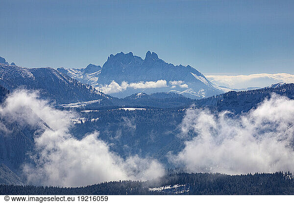 Austria  Salzburger Land  Saint Gilgen  Fog over Salzkammergut mountains with Dachstein range in distant background