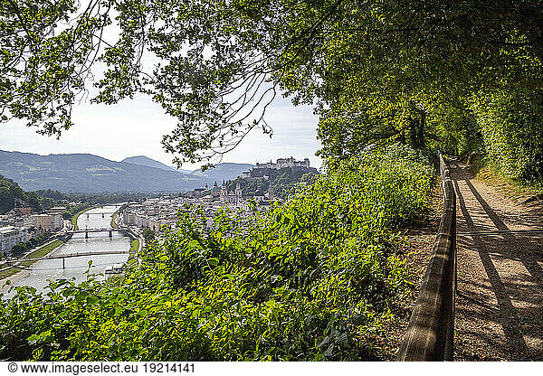 Austria  Salzburger Land  Salzburg  Riverside city seen from hilltop footpath