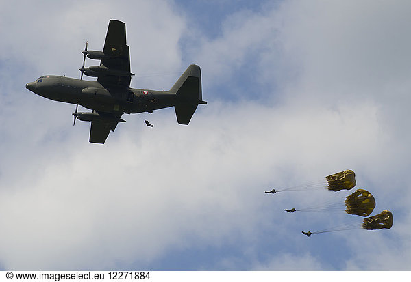 Austria  Styria  Military Airplane Hercules and sky-divers