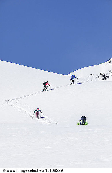 Austria  Tyrol  between Ischgl and Galtuer  ski tourers climbing up a mountain in winter