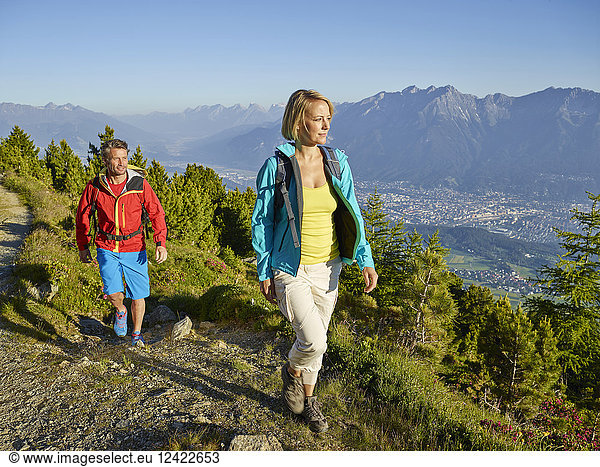 Austria  Tyrol  Couple hiking the Zirbenweg at the Patscherkofel