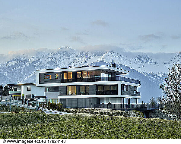 Austria  Tyrol  Facade of luxurious three-storey house in mountains