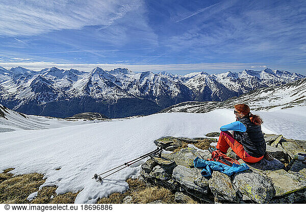 Austria  Tyrol  Female skier taking break at Hundskehljoch pass