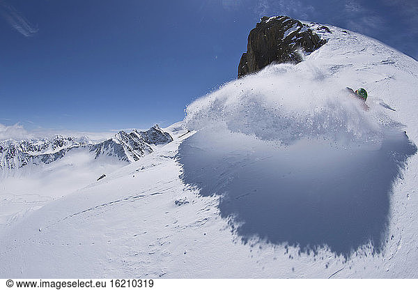 Austria  Tyrol  Mature man skiing in slope