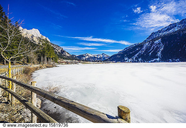 Austria  Tyrol  Shore of frozen Haldensee lake
