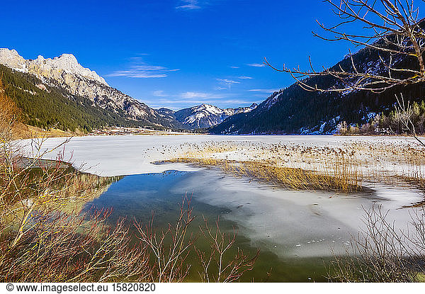 Austria  Tyrol  Shore of frozen Haldensee lake
