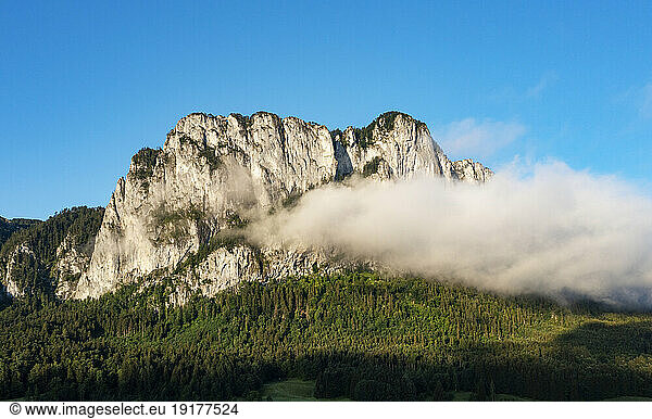 Austria  Upper Austria  Drone view of fog gathering in front of Drachenwand mountain