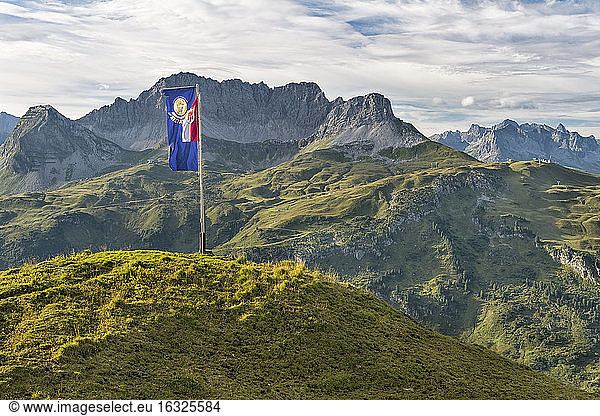 Austria  Vorarlberg  Lechtal  alpine landscape with flag at Widderstein hut