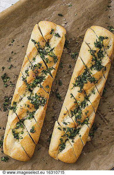 Baguette with herb butter  close up