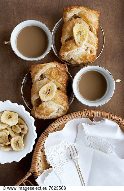Baked pastries with banana and coffee
