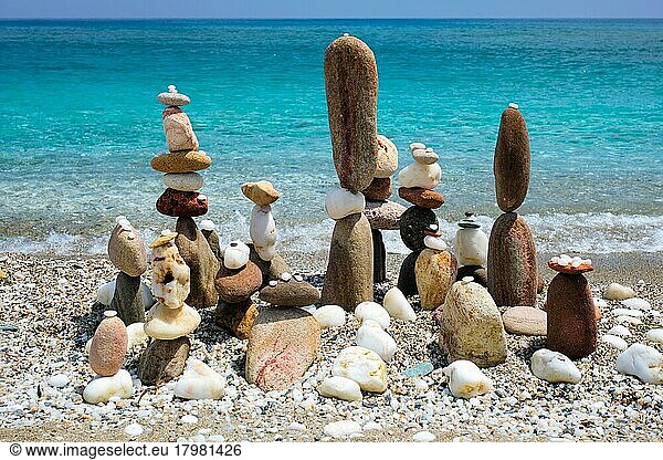 balance and harmony concept  stacked stones on beach  coast