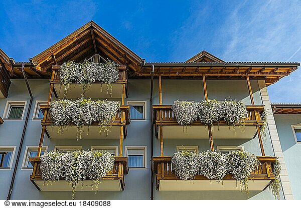 Balconies decorated with flowers in the centre of Ortisei  Val Gardena  Dolomites  South Tyrol  Italy  Europe