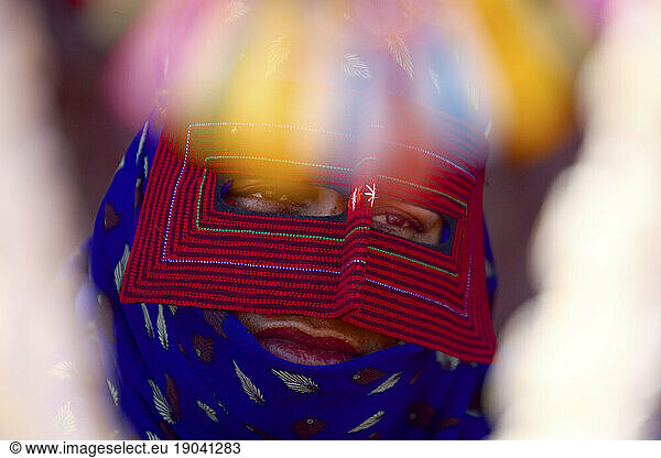 Bandari Woman Wearing A Traditional Mask
