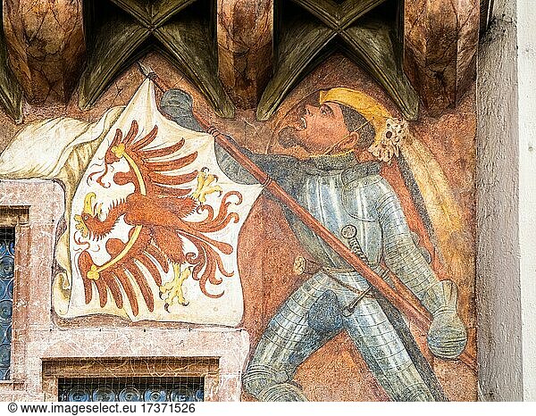 Banner bearer with armour carries white flag with red eagle  fresco  Goldenes Dachl  Innsbruck  Tyrol  Austria  Europe
