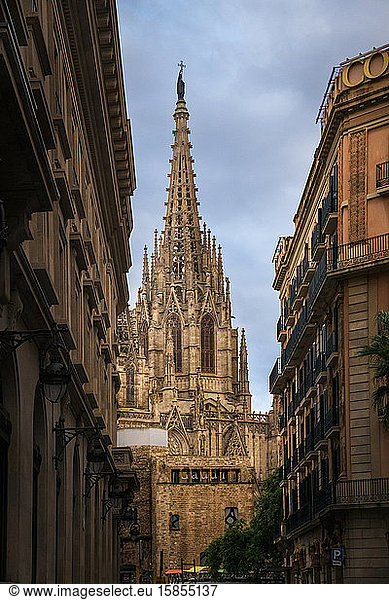 Barcelona cathedral seen at the end of a narrow street