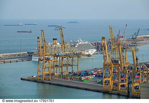 BARCELONA  SPAIN  APRIL 15  2019: Aerial view of Barcelona port with harbour cranes and ruise ship. Barcelona  Spain  Europe