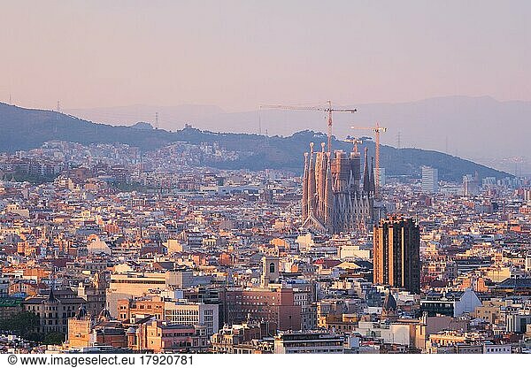 BARCELONA  SPAIN  APRIL 15  2019: View of Barcelona city cityscape with Sagrada Familia church on sunset. Barcelona  Spain  Europe