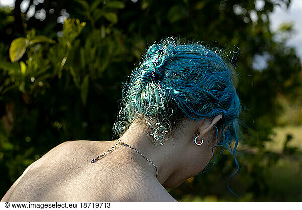 Bare Back Of Blue Haired Girl Wearing Necklace