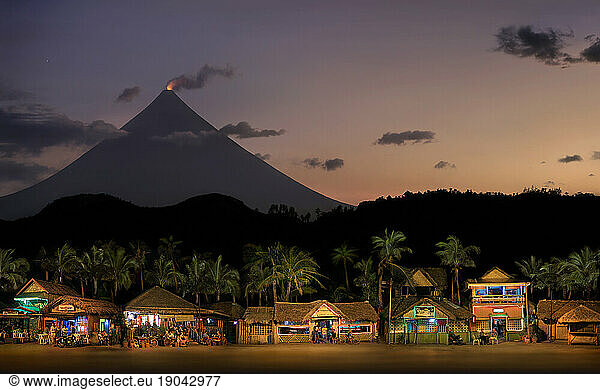 Bars and restaurants at foot of Mayon Volcano (crater glow)  Legazpi  Albay  Philippines