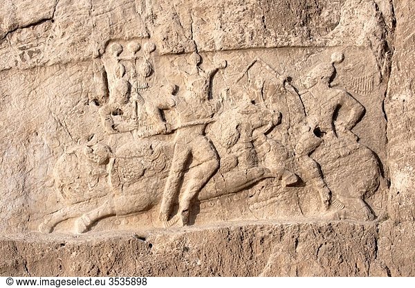 Bas relief at the tombs of the kings in the Naqsh-e Rostam necropolis near Persepolis  Iran