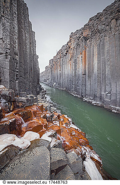 basalt column canyon with geometric shapes