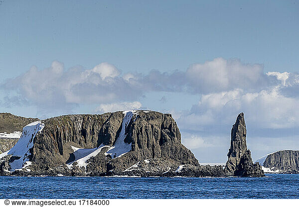 Basalt pinnacle and cliffs in English Strait in the South Shetland ...