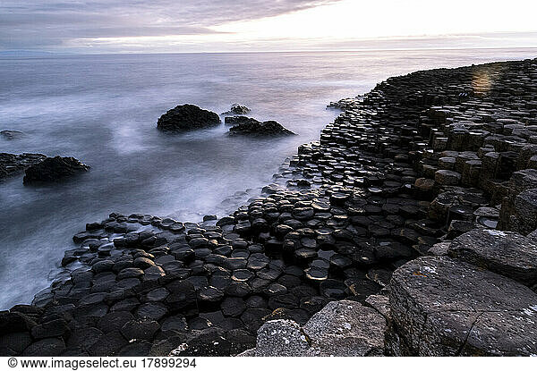 Basalt stones on coastline at sunset  Giant's Causeway  Northern Ireland