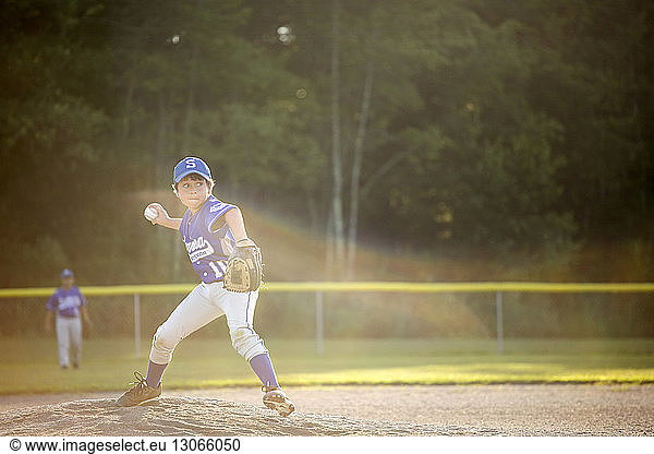 Baseball pitcher throwing ball