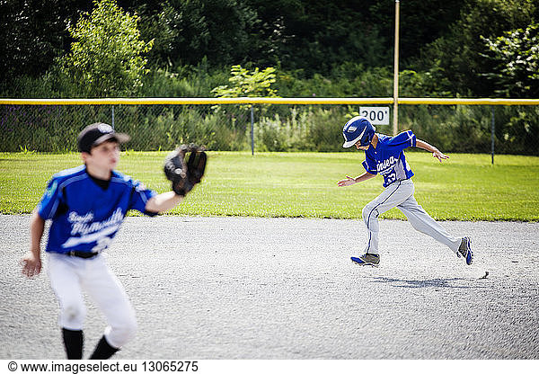 Baseball player running on field