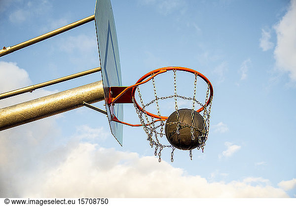 Basketball ball in the basketball hoop