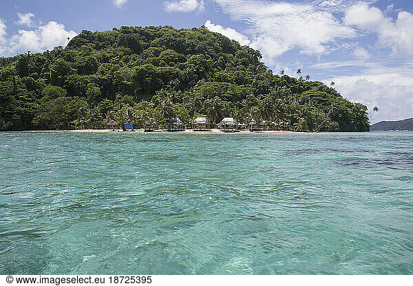 Beach huts on small island of the South pacific  Samoa