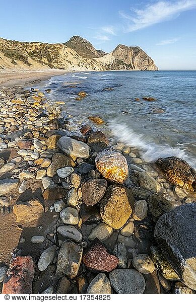 Beach with coloured stones  sandy beach with rocky cliffs  Paralia Paradisos  Kos  Dodecanese  Greece  Europe