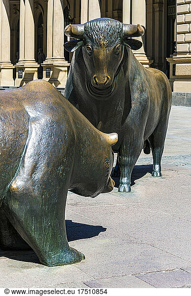 Bear and bull statue on footpath during sunny day at Frankfurt  Germany