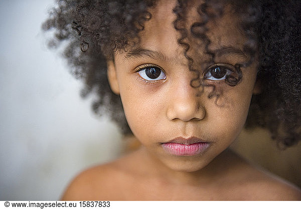 Beautiful Afro-Brazilian little girl with curly hair