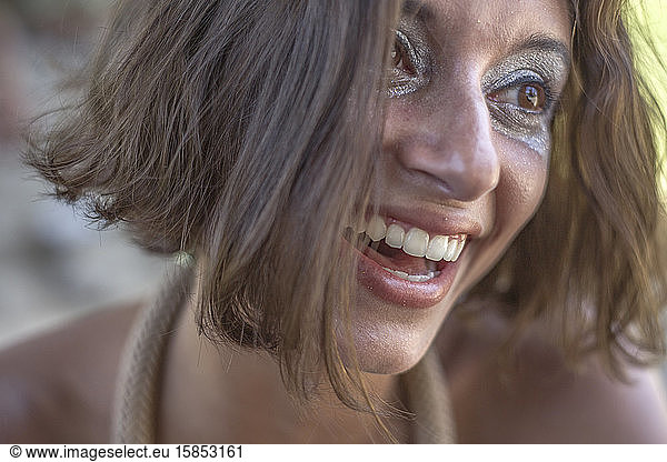 Beautiful and smiling young woman in Rio carnival