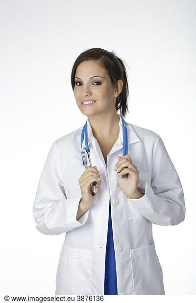 Beautiful Caucasian doctor or nurse on a white background