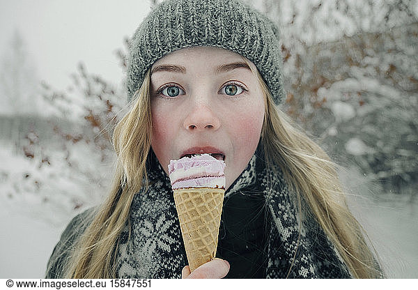 Beautiful girl eating ice cream