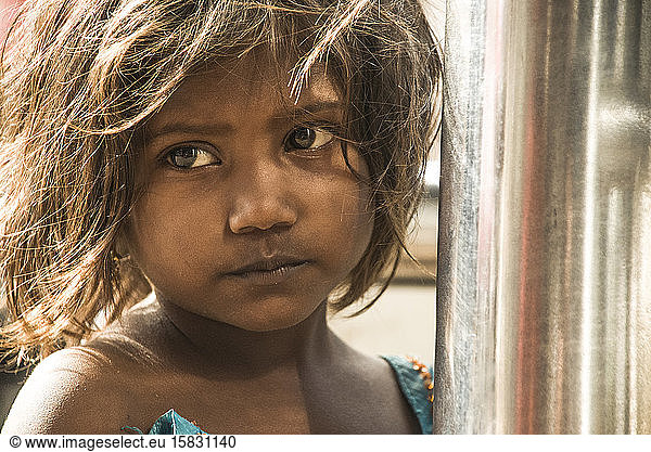 Beautiful homeless child in the streets of Mumbai