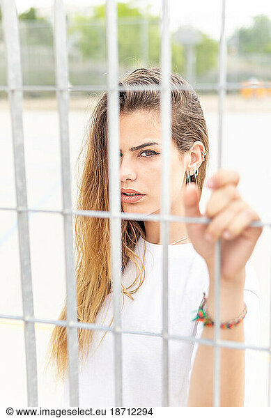 Beautiful smiling girl wearing casual summer clothes enjoys sunny day. Beauty  fashion shot.