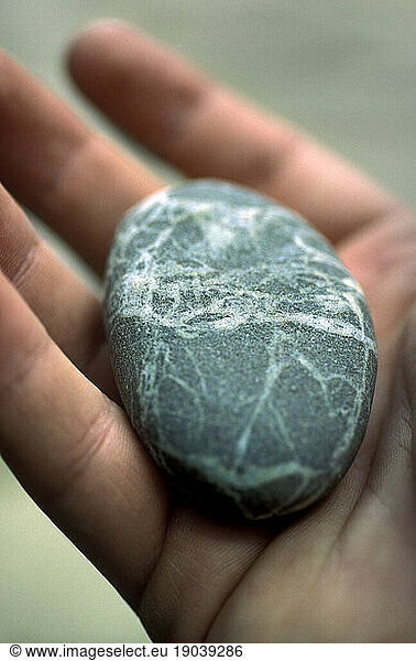 Beautiful stone in hand.